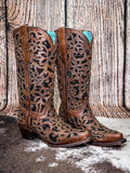 boots on cowhide, wood backdrop