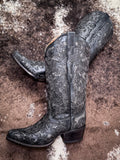 boots on cowhide