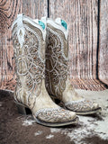 boots on cowhide, wood backdrop
