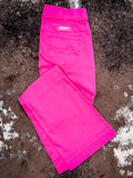 Trouser jeans folded on cowhide.