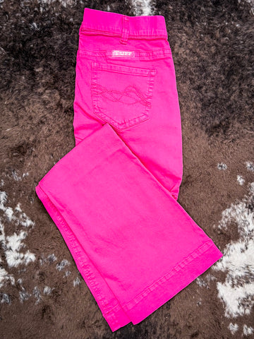 Trouser jeans folded on cowhide.