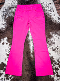 Full view of jeans laying on cowhide.