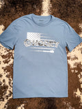 Front of shirt displayed on cowhide with a hat.