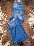 Trouser Jeans displayed on cowhide.