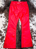 Front view of trouser jeans displayed on cowhide.