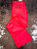 Trouser jeans displayed on cowhide.