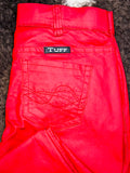 Close up of back pocket on trouser jeans.