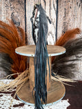 Side view of the Tumbleweed Trail Crossbody on a wood backdrop.