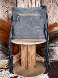 Back view of the Tumbleweed Trail Crossbody on a wood backdrop.