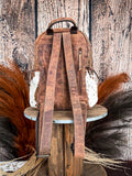 Back view of the Mountain Range Backpack on a wood background.
