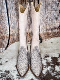 Front view of the Addie Glitter Knee High Boot in Taupe By Very G on a wood backdrop.