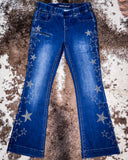 Flat lay of the Cowgirl Tuff Pull-On Star Trouser on cowhide.