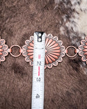 Tape measure showing the size of the conchos on the Sunfire Concho Chain Belt.