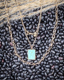 Arrow Rock Trail Fashion Necklace displayed on beans and wheat.