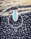 Sage Hollow Fashion Hoop Earring displayed on beans and wheat.