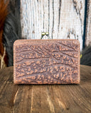 Back view of the Mesa Terra Vintage Style Wallet on a wood table, wood backdrop.