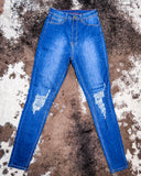 Front view of the Badlands Rip Skinny Jeans displayed on cowhide.