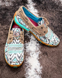 The Trailblazer Twisted X Boat Shoe Driving Moc displayed on cowhide.