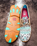 Top and bottom of the Trailblazer Twisted X Boat Shoe Driving Moc displayed on cowhide.