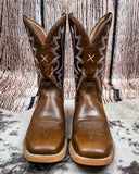 Front view of the Rio Twisted X Women's 11" Tech X Boot displayed on cowhide with a wood backdrop.