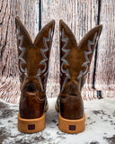 Back view of the Rio Twisted X Women's 11" Tech X Boot displayed on cowhide with a wood back drop.