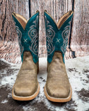 Front view of the Callie Twisted X Women's 11" Tech X Boot displayed on cowhide with a wood backdrop