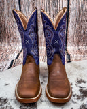 Front view of the Azalea Twisted X Women's 11" Tech X Boot displayed on cowhide with a wood backdrop