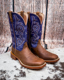Side view of the Azalea Twisted X Women's 11" Tech X Boot displayed on cowhide with a wood backdrop