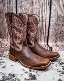 Side view of the Sandi Twisted X Women's 11" Tech X Boot displayed on cowhide with a wood backdrop.