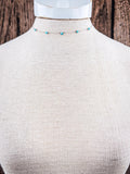 The 5 Stone Genuine Turquoise Choker Necklace shown on a mannequin.