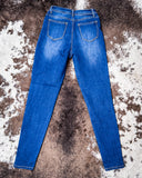 Back view of the Midnight Range Skinny Jeans displayed on cowhide.