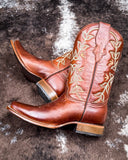 Rustwood Rodeo Circle G Boots laying on cowhide.