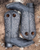 The Coal Canyon Circle G Boots displayed on cowhide.