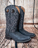 Side view of the Coal Canyon Circle G Boots in a wood backdrop.