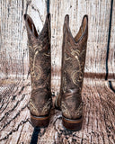 Back view of the Dustwing Canyon Circle G Boots in front of a wood backdrop.