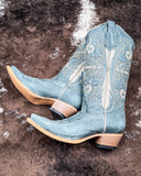 The Blue Ridge Wrangler Circle G Boots displayed on cowhide.