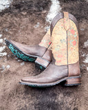 The Bronco Belle Circle G Boots displayed on cowhide.