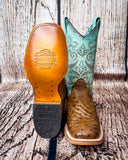 Sole view of the Stormbird Ostrich Corral Boots in front of a wood backdrop.
