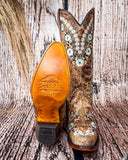 Front and bottom of the Rodeo Afterglow Corral Boots in a wood backdrop.