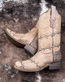 The Barbed Trailblazer Corral Boots displayed on cowhide.
