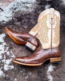 The Canyon Lace Corral Boots displayed on cowhide.
