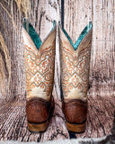 Back view of the Canyon Lace Corral Boots in a wood backdrop.