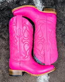 The Fuchsia Outlaw Corral Boots displayed on cowhide.