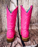 Back view of the Fuchsia Outlaw Corral Boots in a wood backdrop.