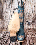 Front and bottom of the Twilight Wrangler Circle G Boots in a wood backdrop.
