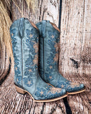 Side view of the Twilight Wrangler Circle G Boots in a wood backdrop.