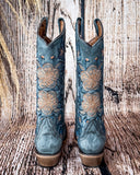 Back view of the Twilight Wrangler Circle G Boots in a wood backdrop.