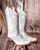 Side view of the Saddlebrush Rose Circle G Boots in a wood background.