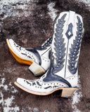The Phantom Mesa Corral Boots displayed on cowhide.