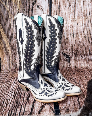 Side view of the Phantom Mesa Corral Boots in a wood backdrop.